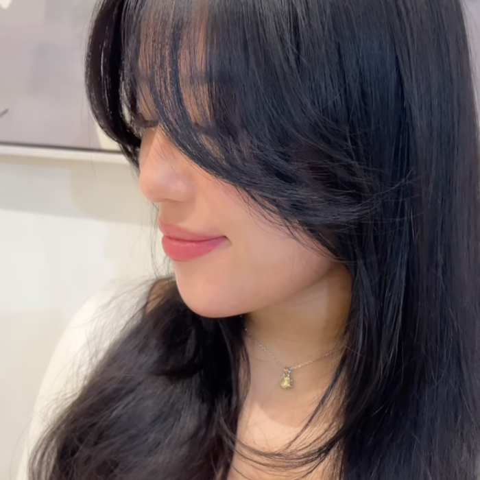 hair after being cut with curtain bangs
